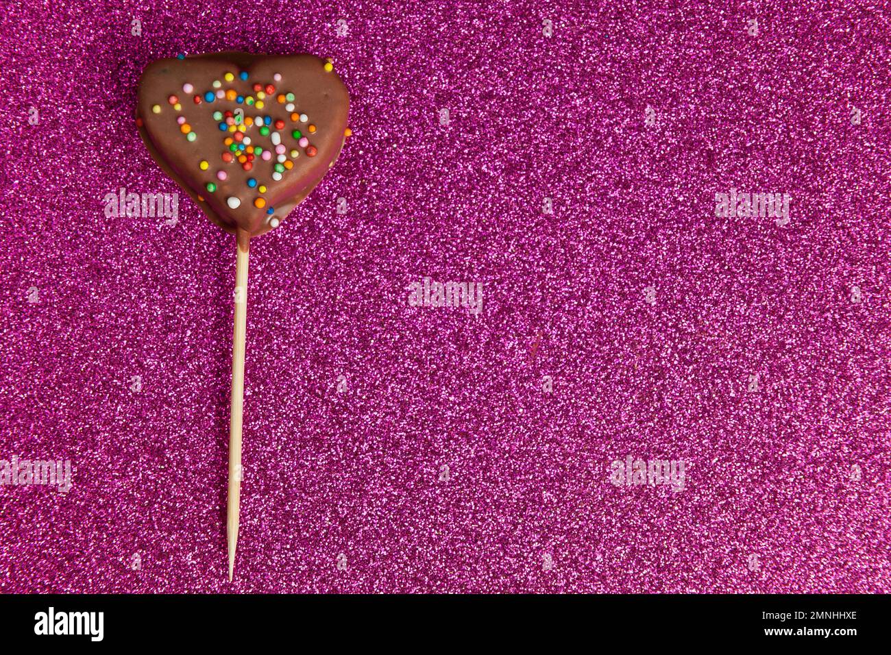 Marshmallows Covered With Chocolate And With Mini Colored Dragees. Stock Photo