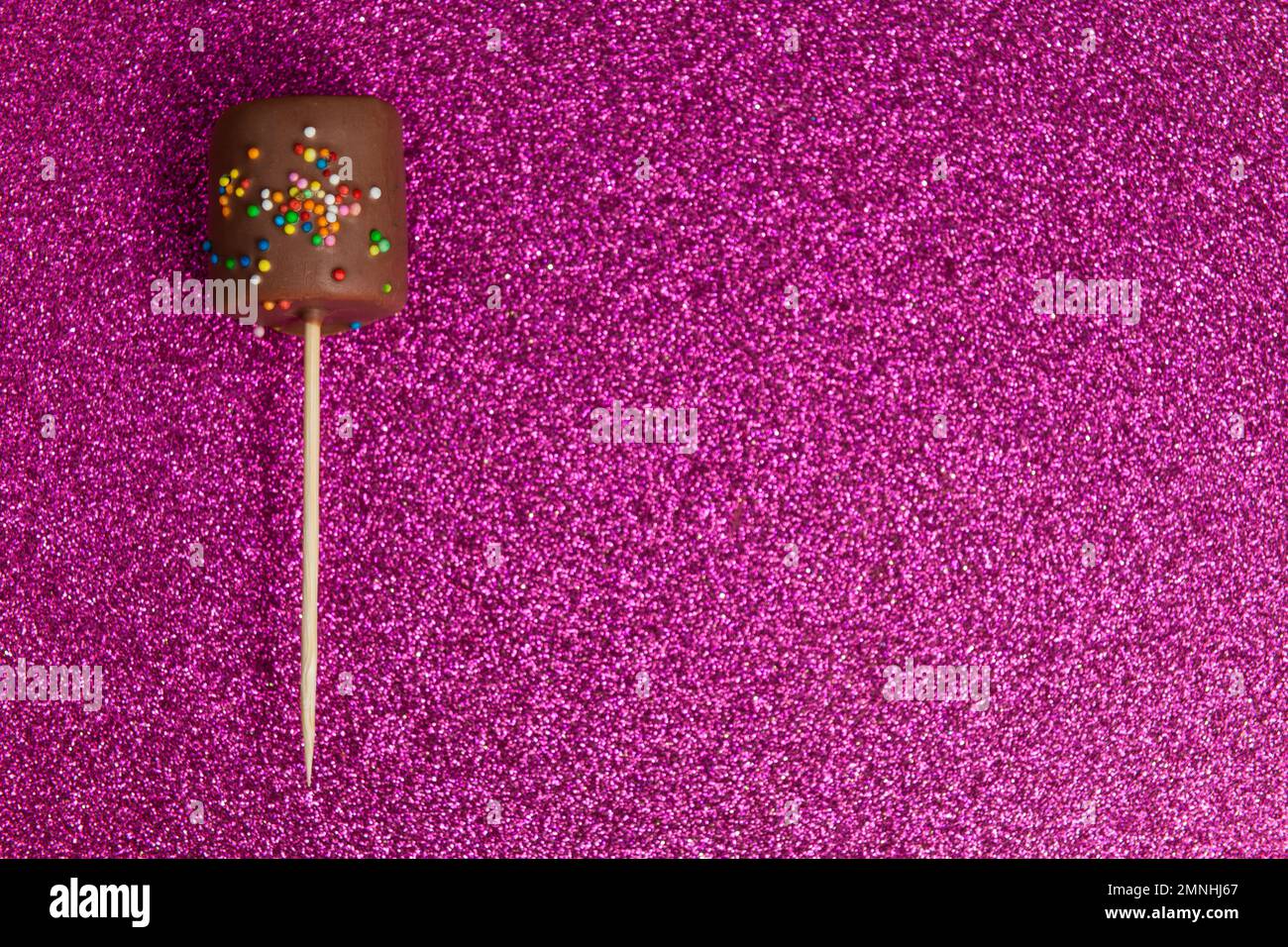 Marshmallows Covered With Chocolate And With Mini Colored Dragees. Stock Photo