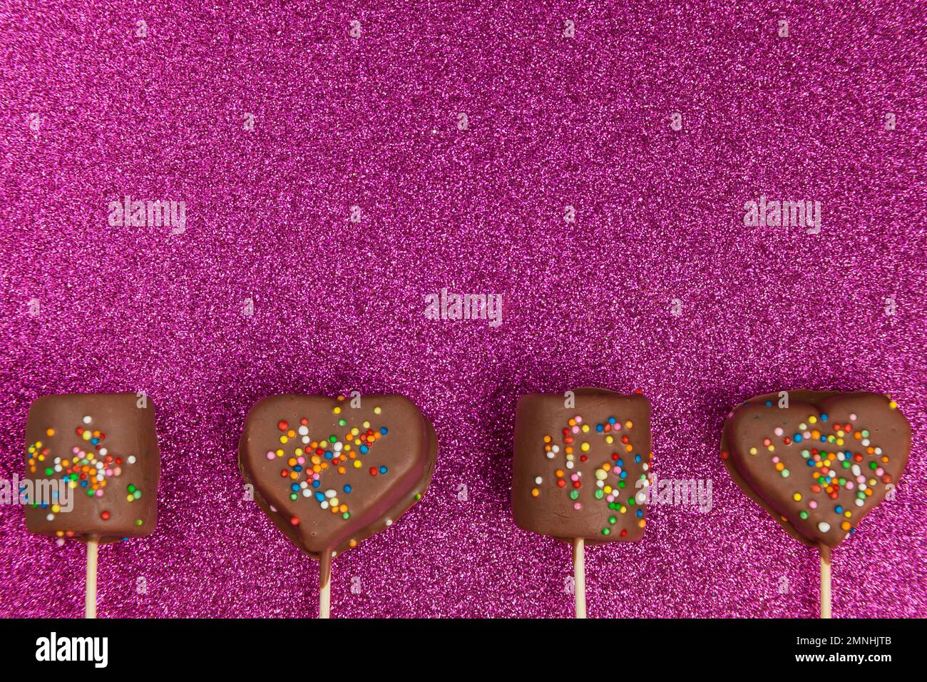 Marshmallows Covered With Chocolate And With Mini Colored Dragees. Stock Photo