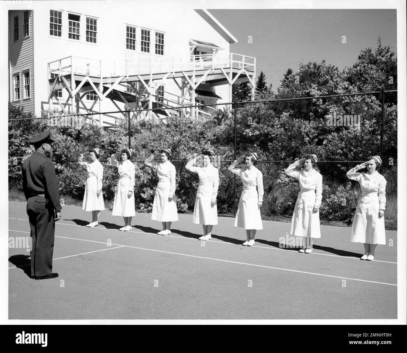 Nurse Corps personnel on duty at Naval Hospital Bermerton, Washington, prepare for Nurse Procurement Program. Indoctrinees receive drill in marching and military formation ca. May 8 1950 Stock Photo