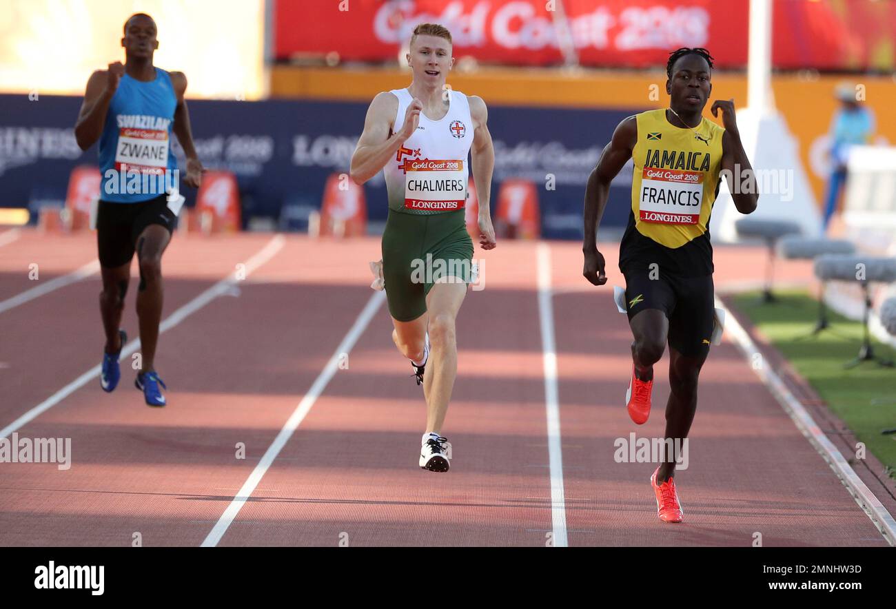 Jamaica's Javon Francis, right, runs in his heat of the men's 400m at