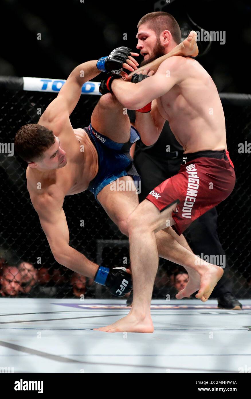Russia's Khabib Nurmagomedov, right, throws Al Iaquinta during the ...