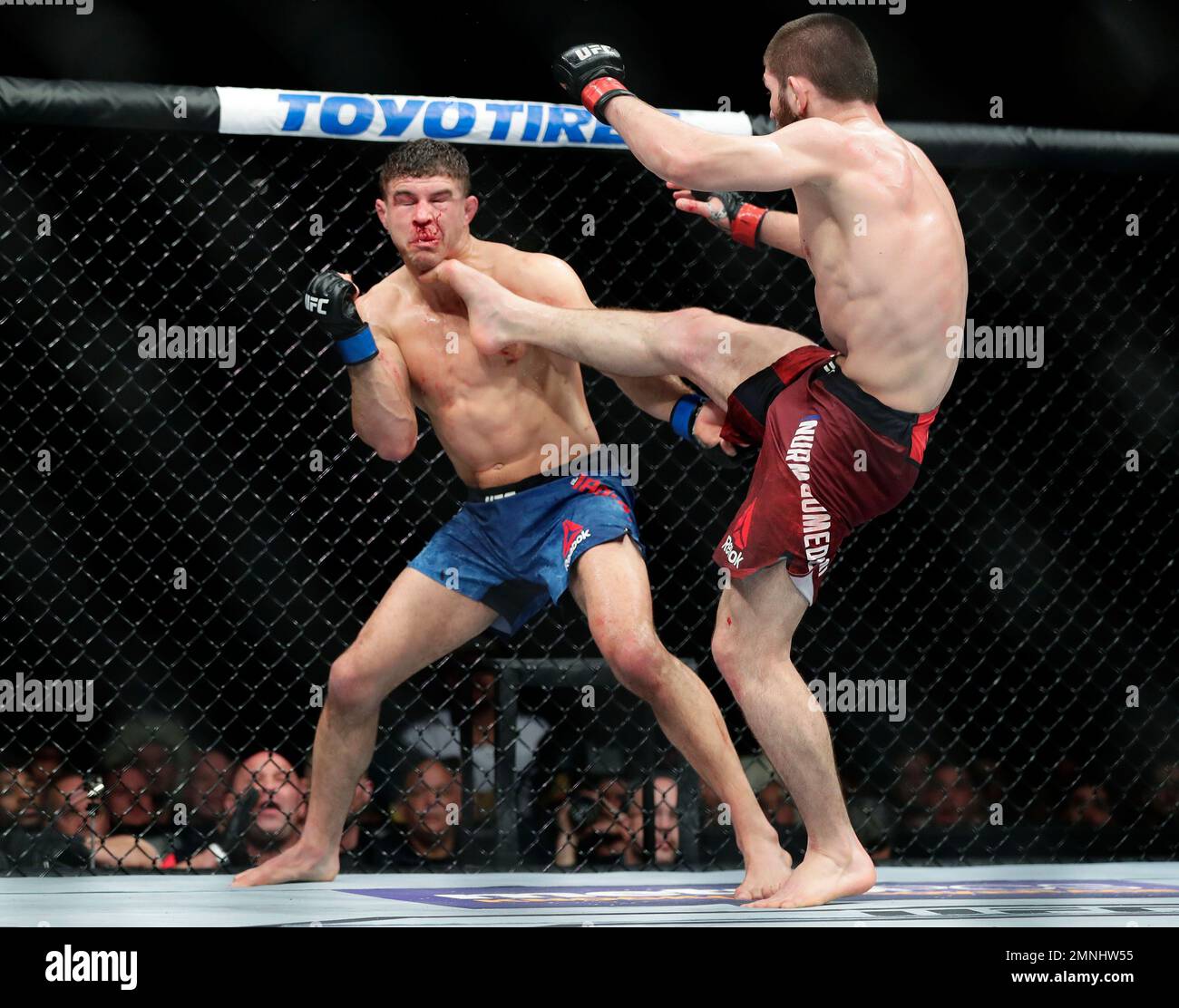 Russia's Khabib Nurmagomedov, right, kicks Al Iaquinta during the ...