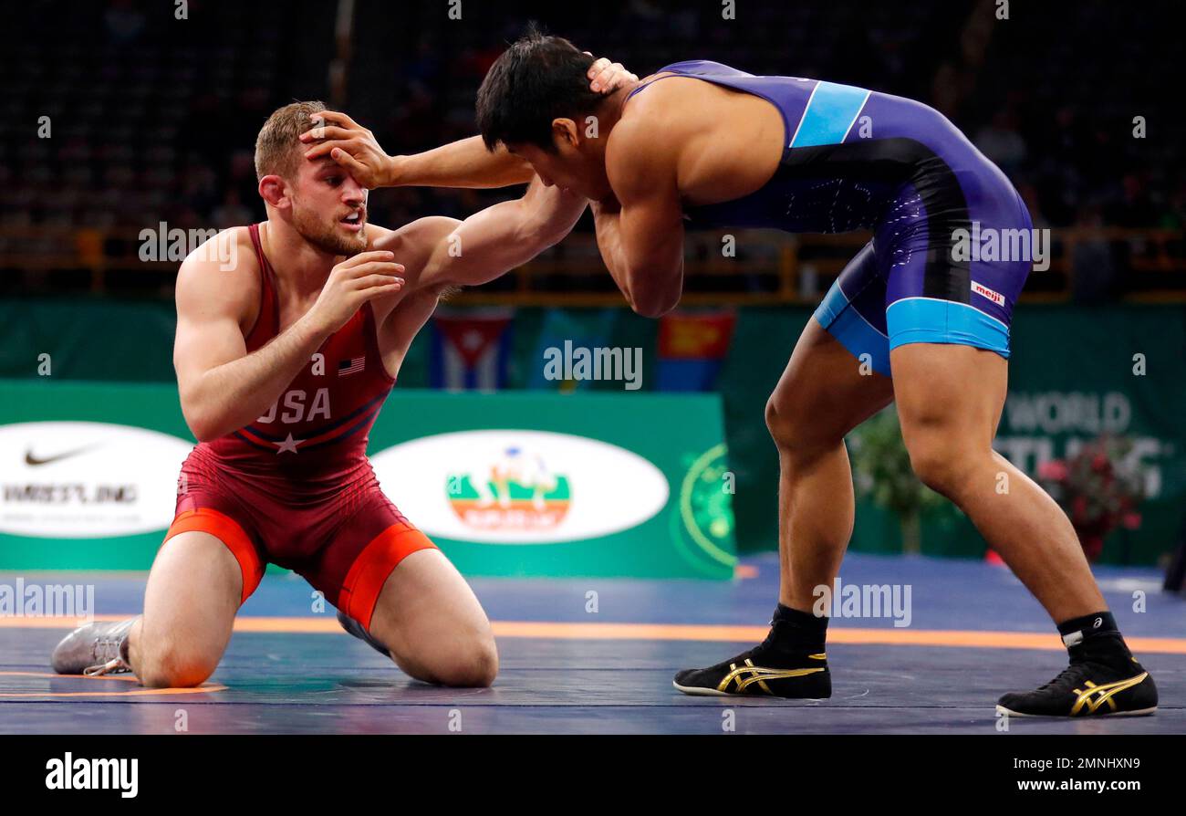 United States David Taylor, left, tries to take down Japans Masao Matsusaka during their 86-kilogram match in the freestyle wrestling World Cup, Saturday, April 7, 2018, in Iowa City, Iowa