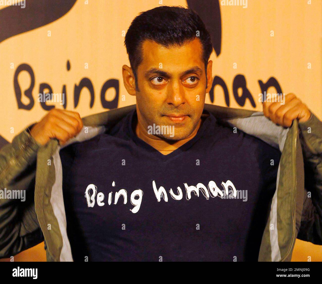 FILE – In this Thursday, Jan. 17, 2013 file photo, Bollywood star Salman  Khan poses wearing a Being Human T-shirt during the launch of Being Human's  first flagship store in Mumbai, India.