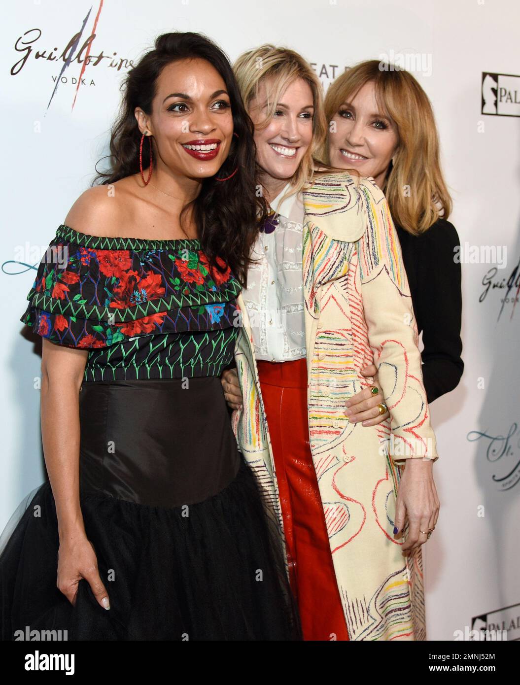 Rosario Dawson, from left, Rachel Winter and Felicity Huffman arrive at