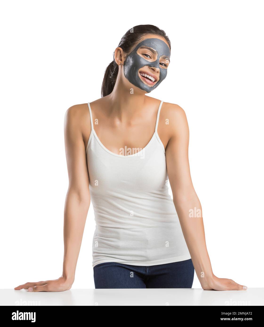 Portrait of young woman with facial beauty mask Stock Photo