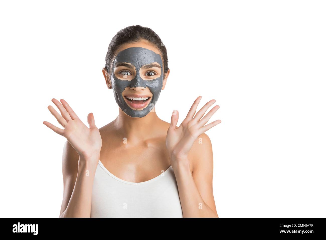 Portrait of young woman with facial beauty mask Stock Photo