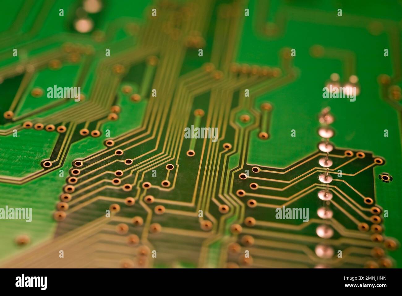 Green and golden computer circuit board Stock Photo - Alamy