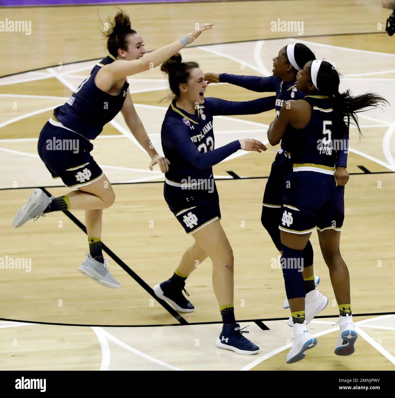 Members of Notre Dame celebrate after defeating Mississippi State in