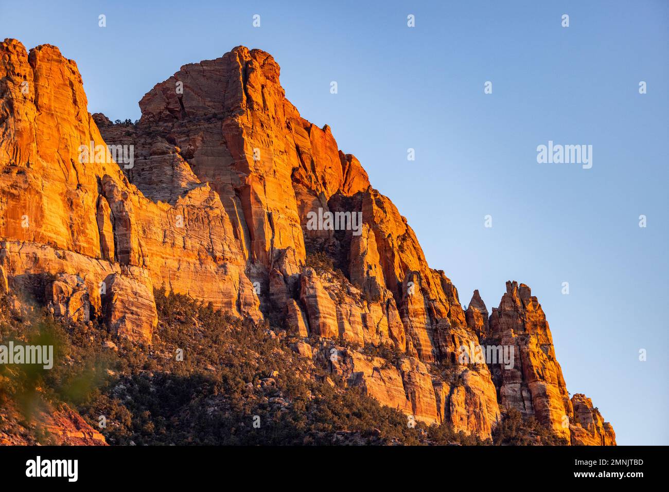 USA, Utah, Springdale, Red cliffs at sunset in Zion National Park Stock Photo