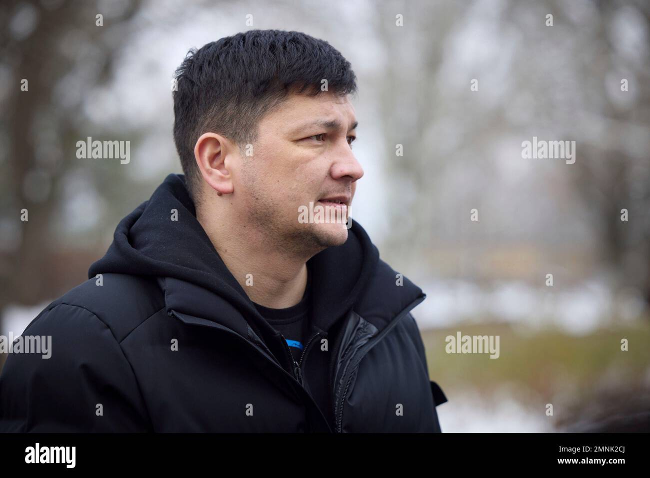 Mykolaiv, Ukraine. 30th Jan, 2023. The Governor of Mykolaiv Oblast Vitaliy Kim, listens during a tour of damaged areas of his city with Ukrainian President Volodymyr Zelenskyy and Danish Prime Minister Mette Frederiksen, on the frontlines 30kms from Russian troops, January 30, 2023 in Mykolaiv, Ukraine. Credit: Ukraine Presidency/Ukrainian Presidential Press Office/Alamy Live News Stock Photo