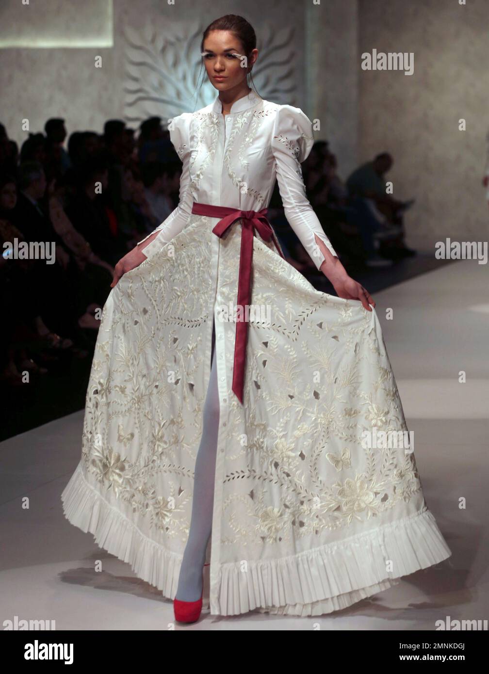 A Model Presents A Creation By Pakistani Designer Zaheer Abbas During a-model-presents-a-creation-by-pakistani-designer-zaheer-abbas-during