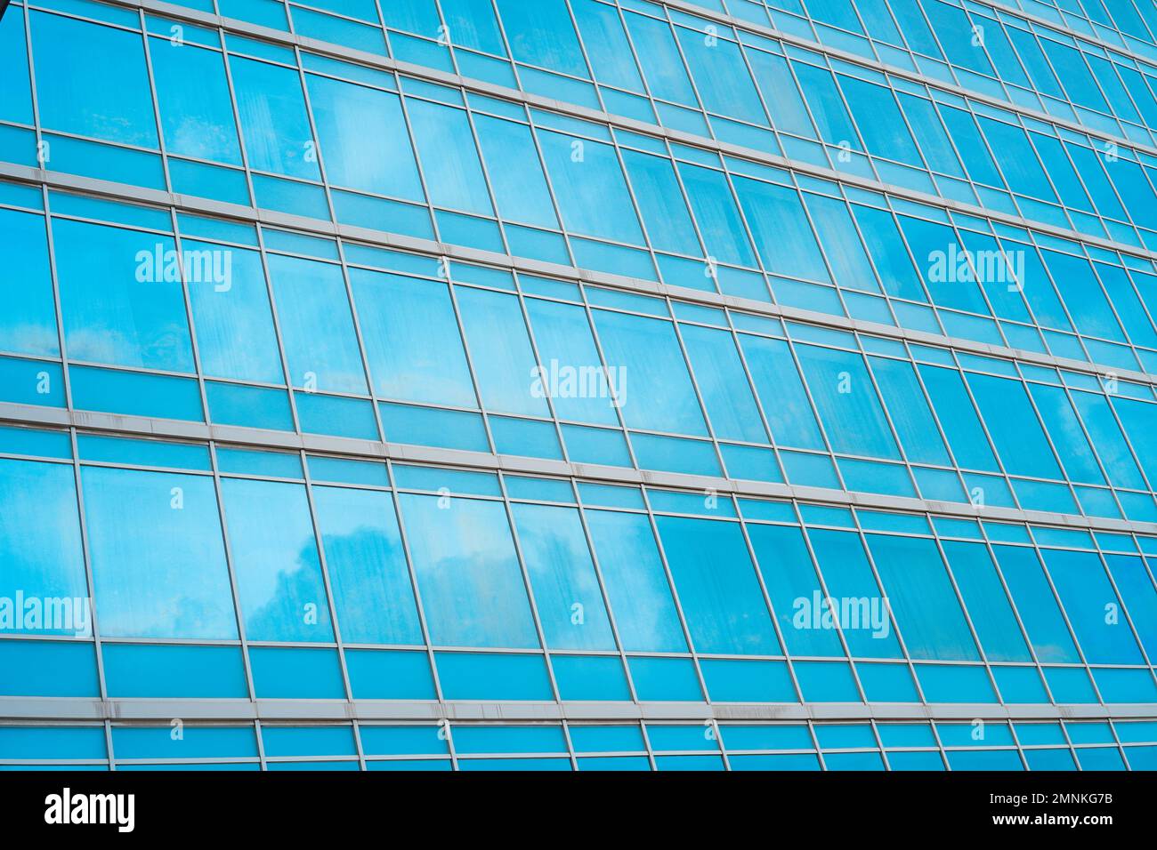 Sky and clouds reflection in the windows of modern skyscraper Stock ...
