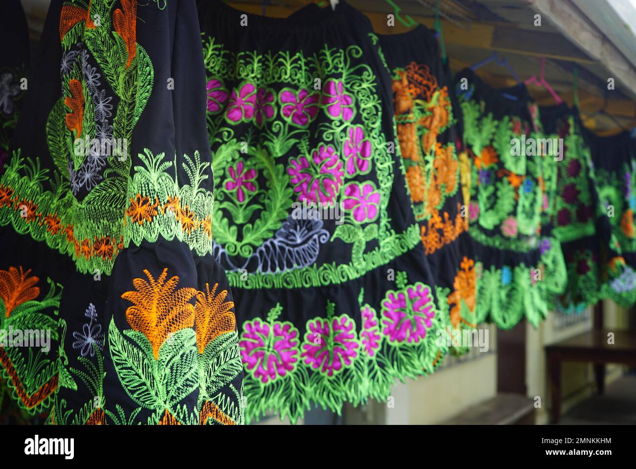 This Oct. 26, 2017 photo shows colorful floral skirts for sale in Pohnpei's  capital city of Kolonia in Micronesia. The skirts are a fashion staple  throughout the island. (AP Photo/Nicole Evatt Stock