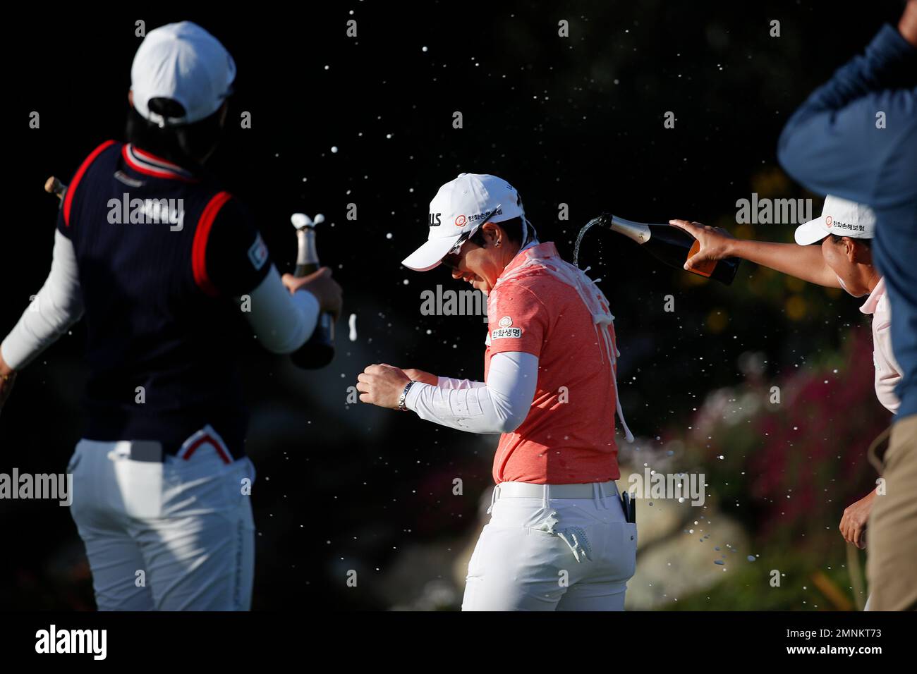 South Korea's Jeong Eun Lee, left, and In-Kyung Kim spray champagne on ...