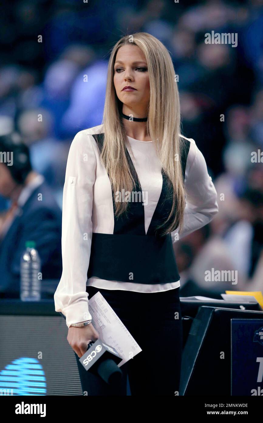 CBS sports reporter Allie LaForce stands on the court during the first half  of an NCAA men's college basketball tournament regional final between  Villanova and Texas Tech, Sunday, March 25, 2018, in