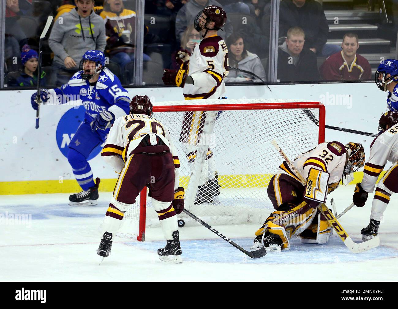 Air Force's Evan Giesler (15) celebrates a goal past Minnesota-Duluth's ...