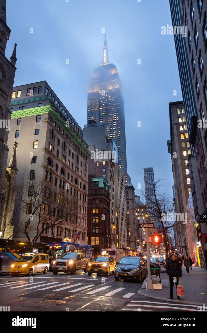 Picture by Tim Cuff. 9 Dec 2022 - 10 Jan 2023. Empire State building in low cloud Stock Photo