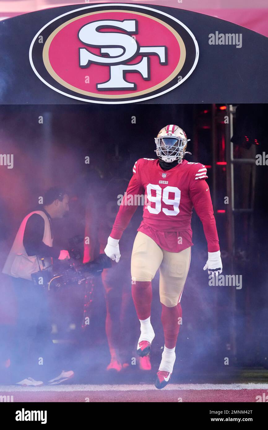 San Francisco 49ers defensive tackle Javon Kinlaw (99) is introduced before  an NFL divisional round playoff football game against the Dallas Cowboys in  Santa Clara, Calif., Sunday, Jan. 22, 2023. (AP Photo/Godofredo