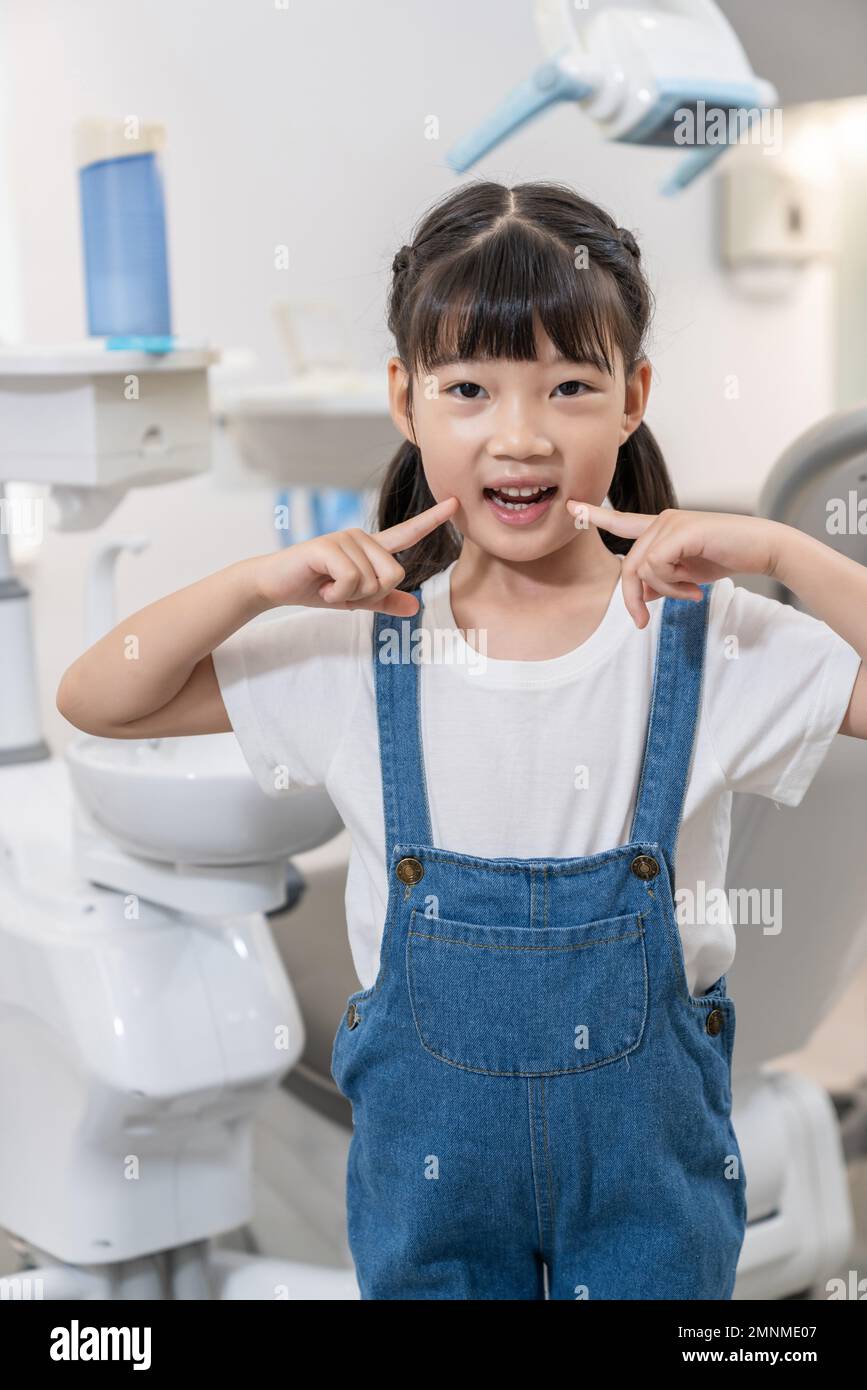 The little girl in dental clinic Stock Photo Alamy