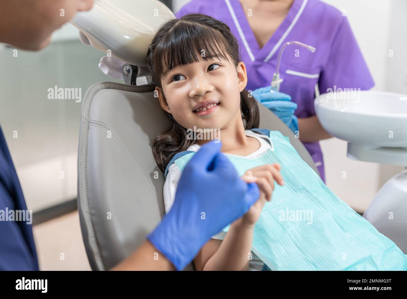 The dentist for the little girl Stock Photo - Alamy