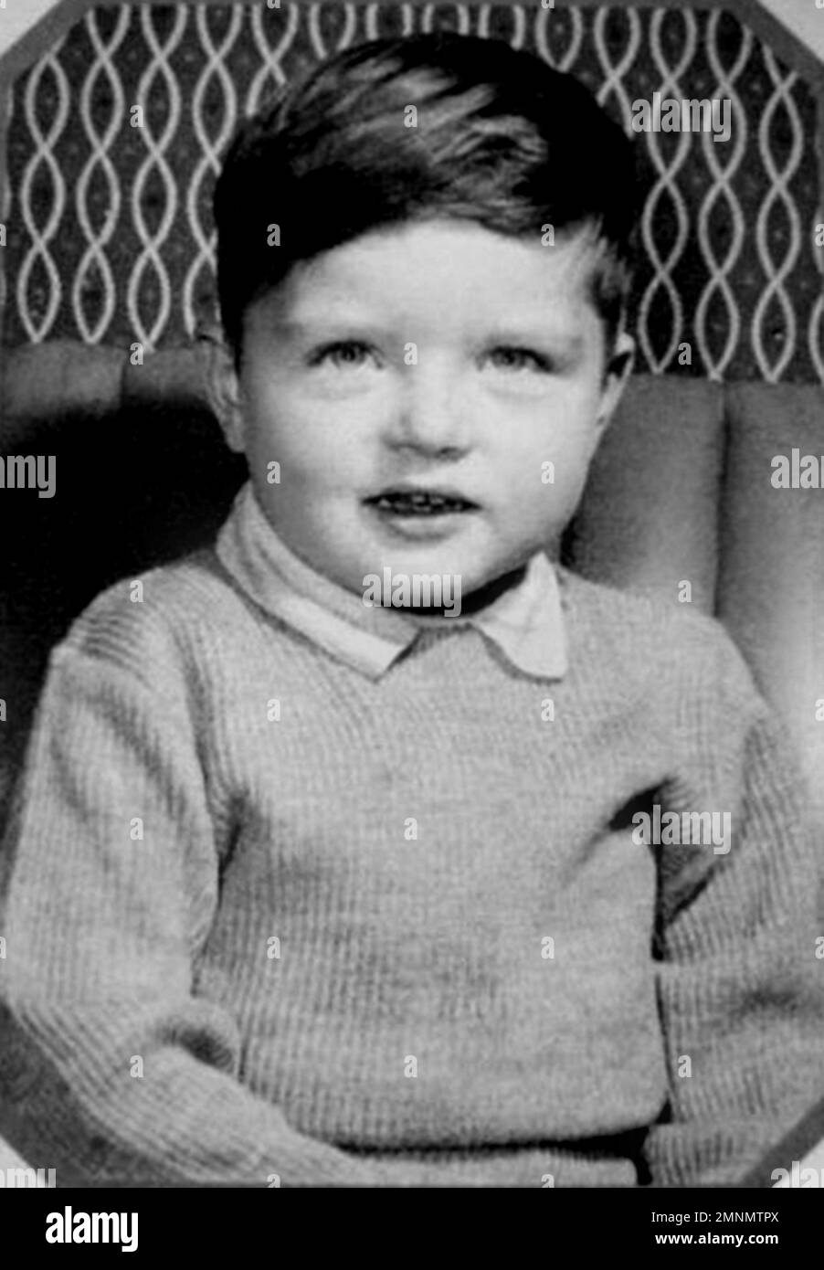 1959 ca , Macclesfield , Cheshire , GREAT BRITAIN : The celebrated british Rock Star singer and composer IAN CURTIS ( 1956 - 1980 ), frontman of New Wave Group JOY DIVISION , when was a young boy aged 3  . Unknown photographer. - HISTORY - FOTO STORICHE - personalità da bambino bambini da giovane - personality personalities when was young -  INFANZIA - CHILDHOOD - BAMBINO - BABY - BABY - BAMBINI - CHILDREN - CHILD - POP MUSIC - MUSICA - cantante - COMPOSITORE - ROCK STAR - DARK - POST PUNK --- ARCHIVIO GBB Stock Photo