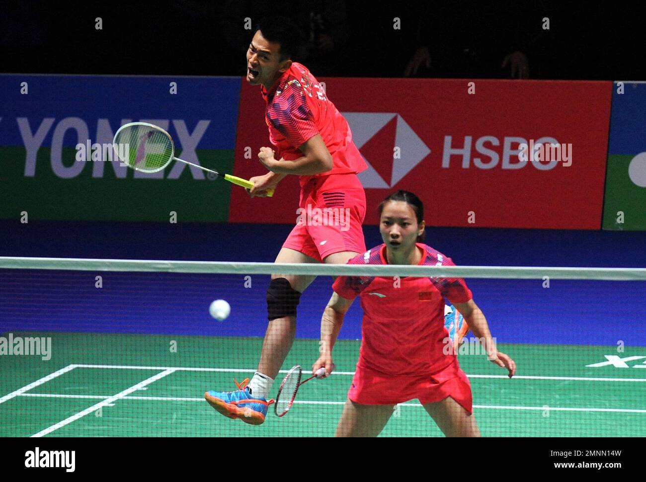 China's Zheng Siwei and Huang Yaqiong, right, play a shot to Japan's ...