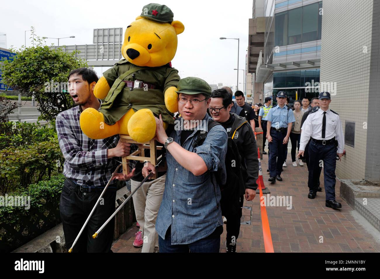 Protesters Raise A Winnie The Pooh Dressing As Communist Party Member 