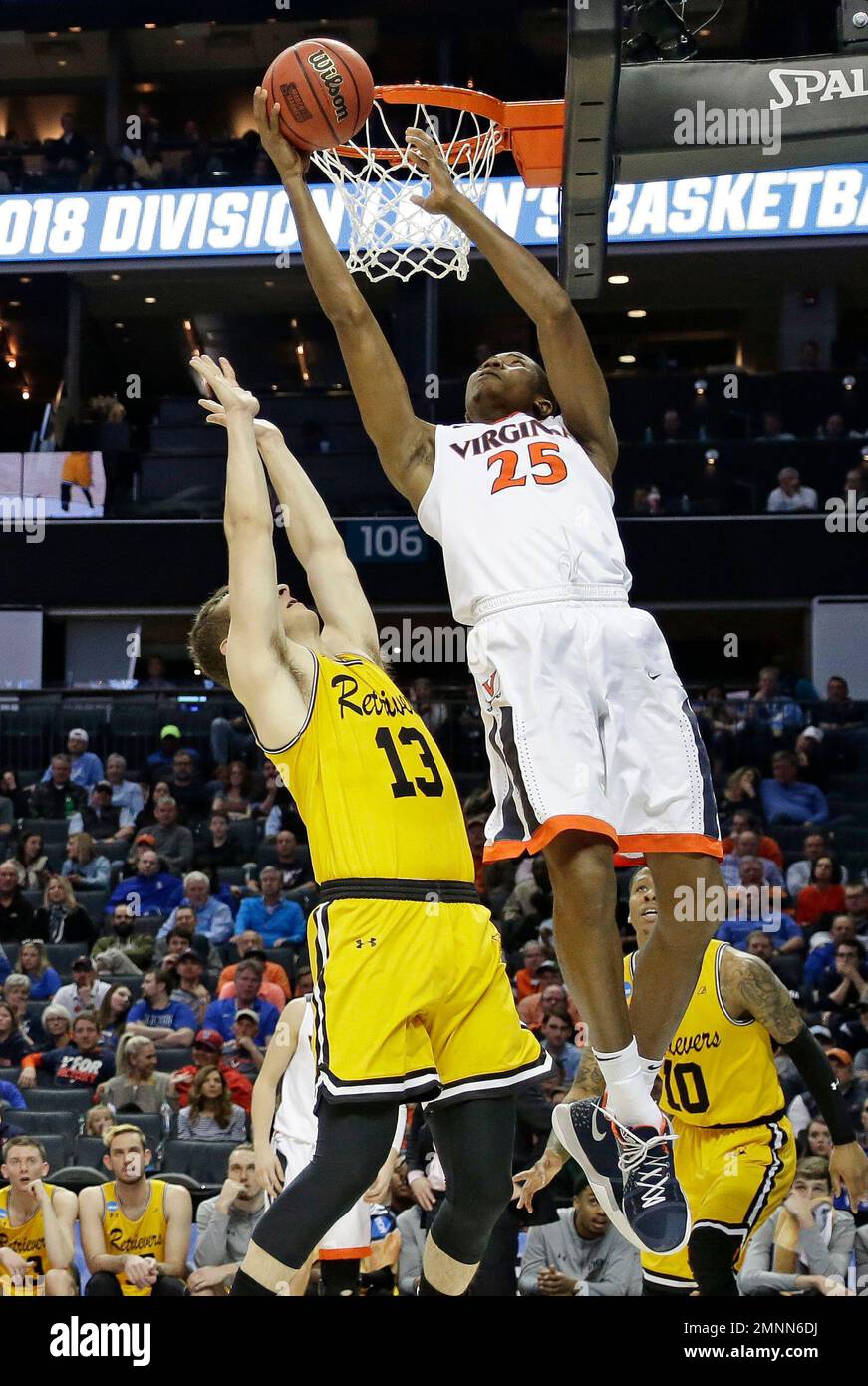 Virginia's Mamadi Diakite (25) shoots over UMBC's Joe Sherburne (13 ...