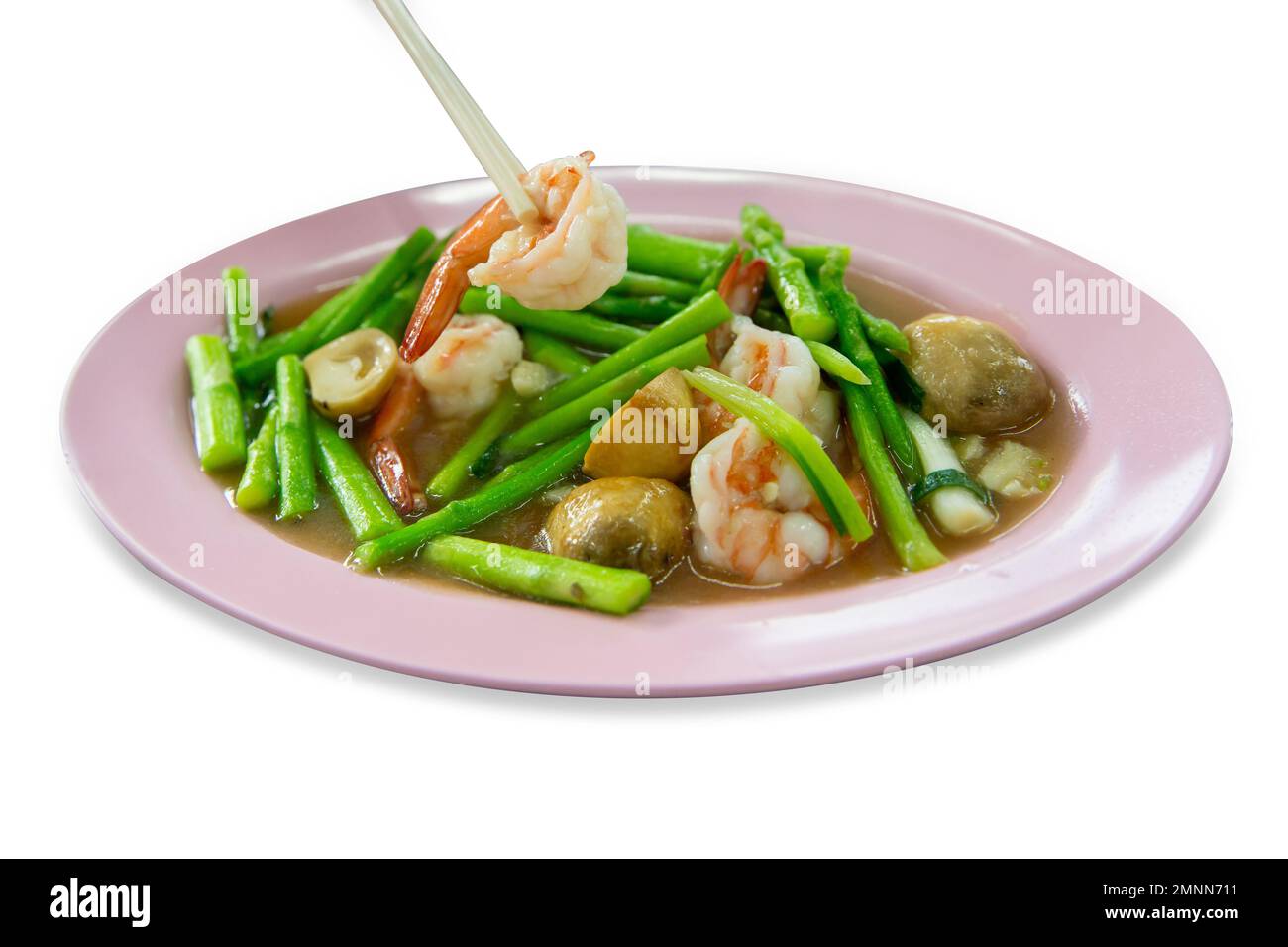 Die cut of Asparagus stir fried with prawns on white isolated Stock