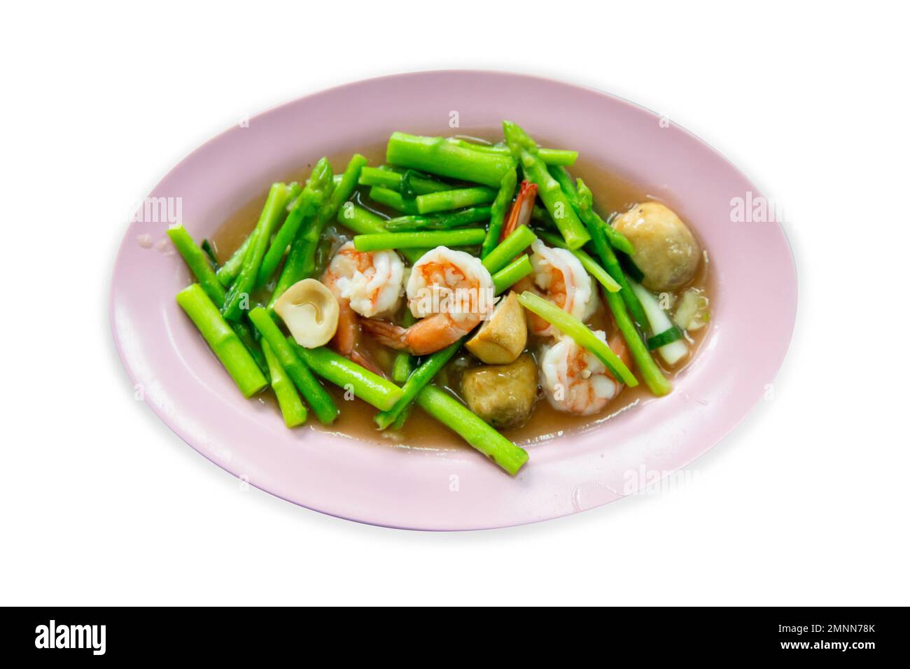 Die cut of Asparagus stir fried with prawns on white isolated Stock