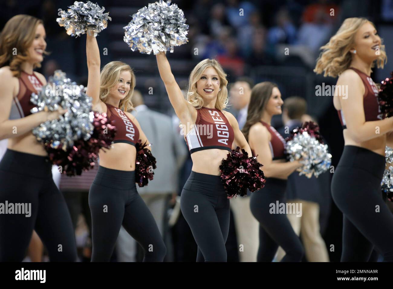Texas A&M cheerleaders perform during the first half of a first-round