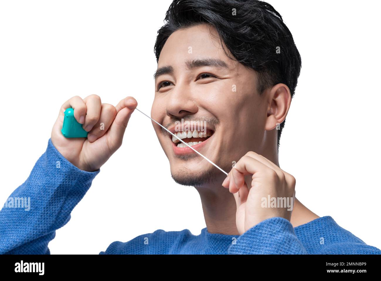 The young man use dental floss Stock Photo Alamy