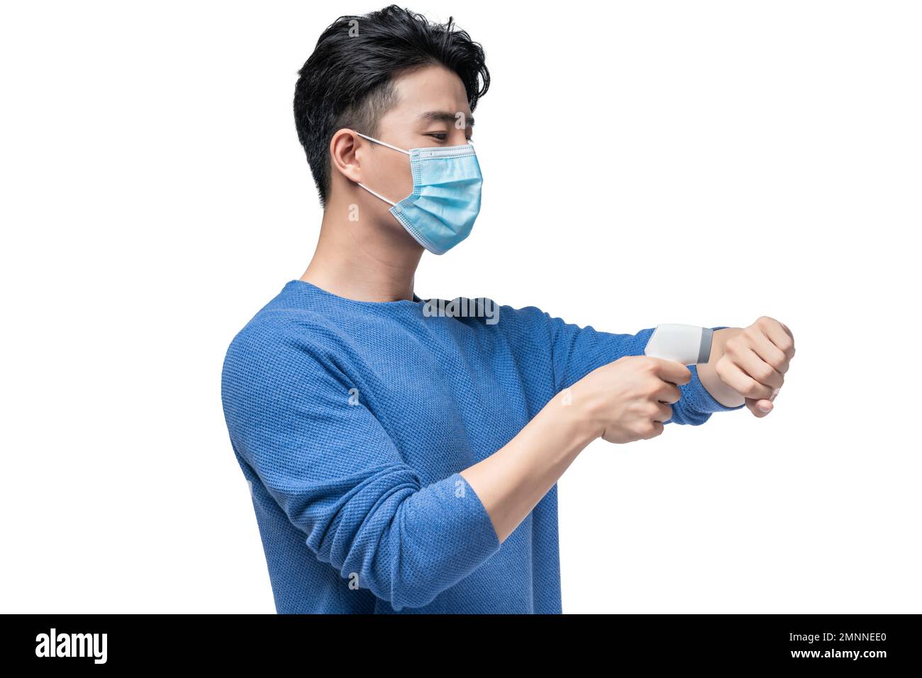The young man holding a surgical masks temperature measurement Stock ...