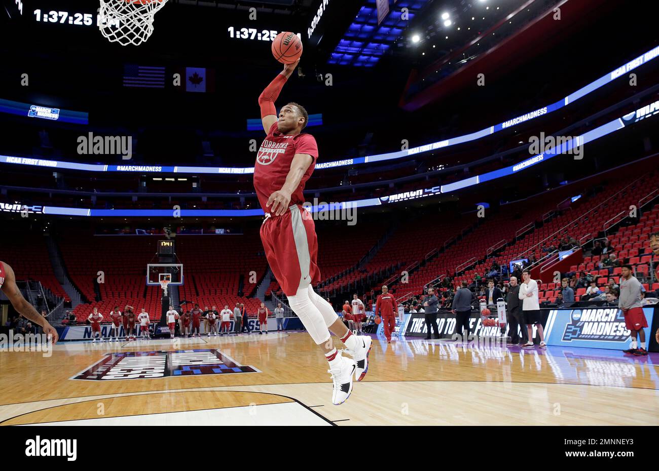 Arkansas forward Daniel Gafford dunks during practice at the NCAA men