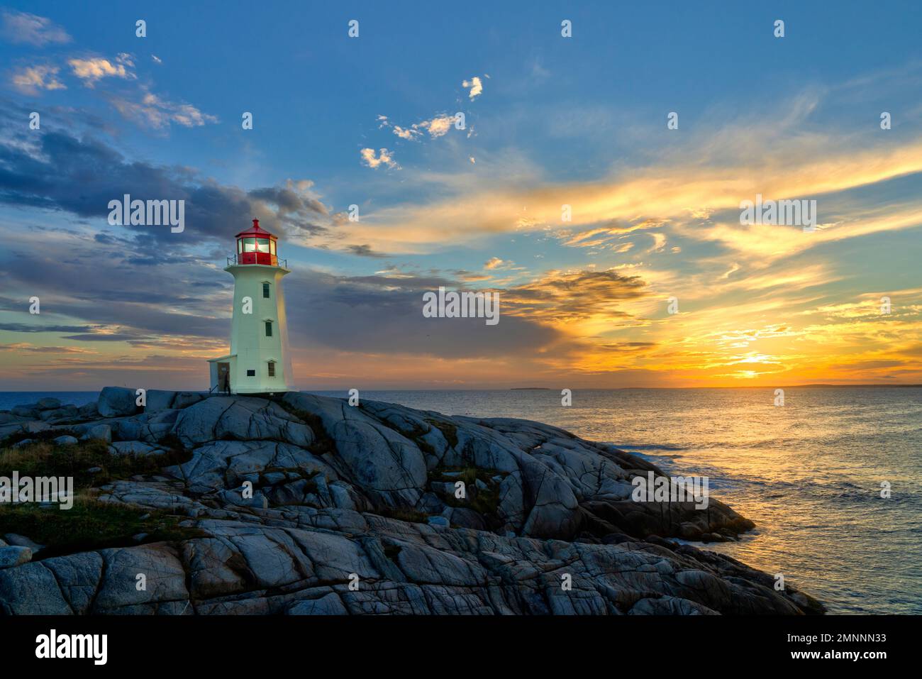 the-lighthouse-at-sunset-at-peggy-s-cove-nova-scotia-canada-stock