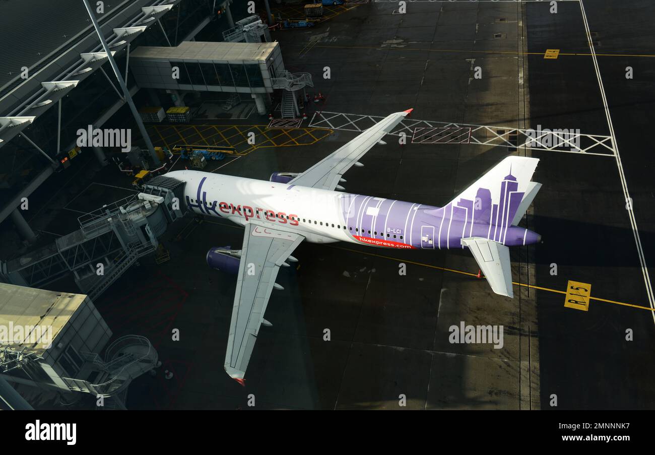 HK express airplane on the tarmac at HKIA, Hong Kong. Stock Photo