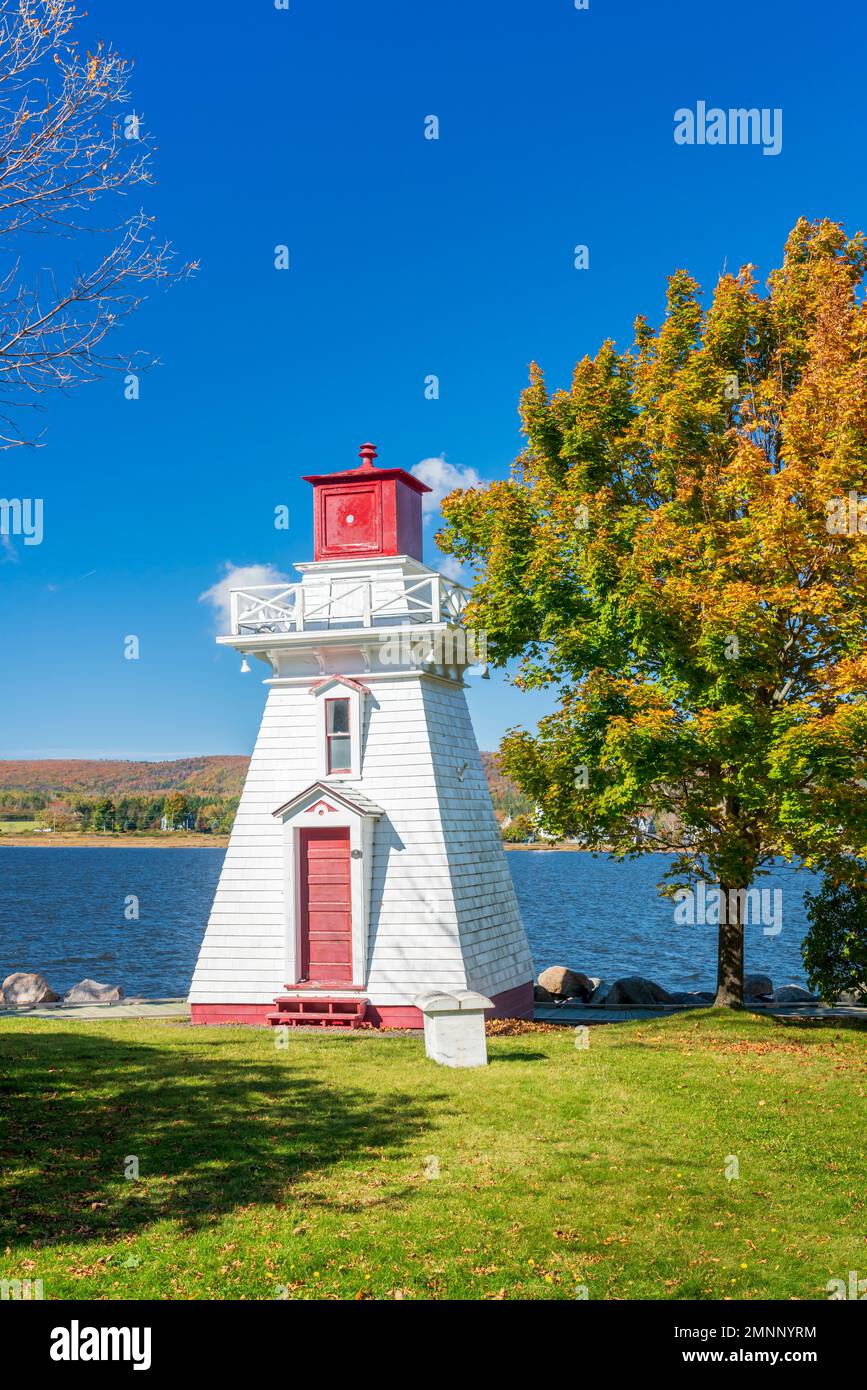 A lighhouse with fall foliage color in Annapolis Royal, Nova Scotia