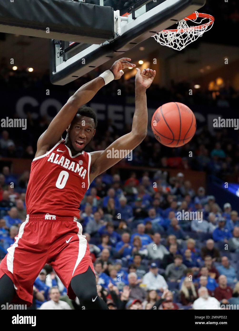 Alabama's Donta Hall dunks during the second half in an NCAA college