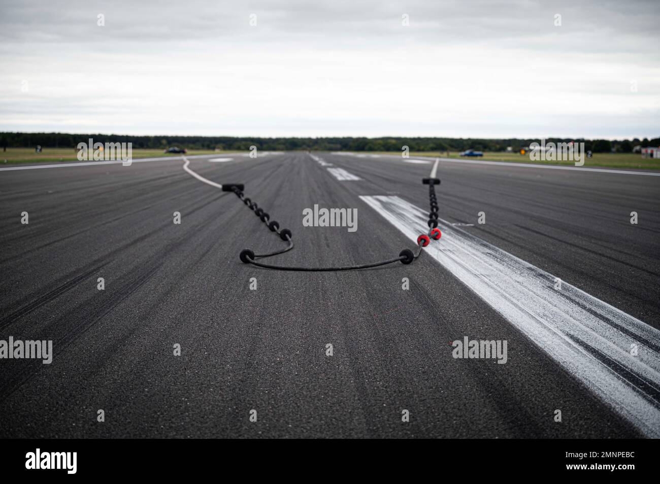 A barrier aircraft arresting landing system sits on the flightline