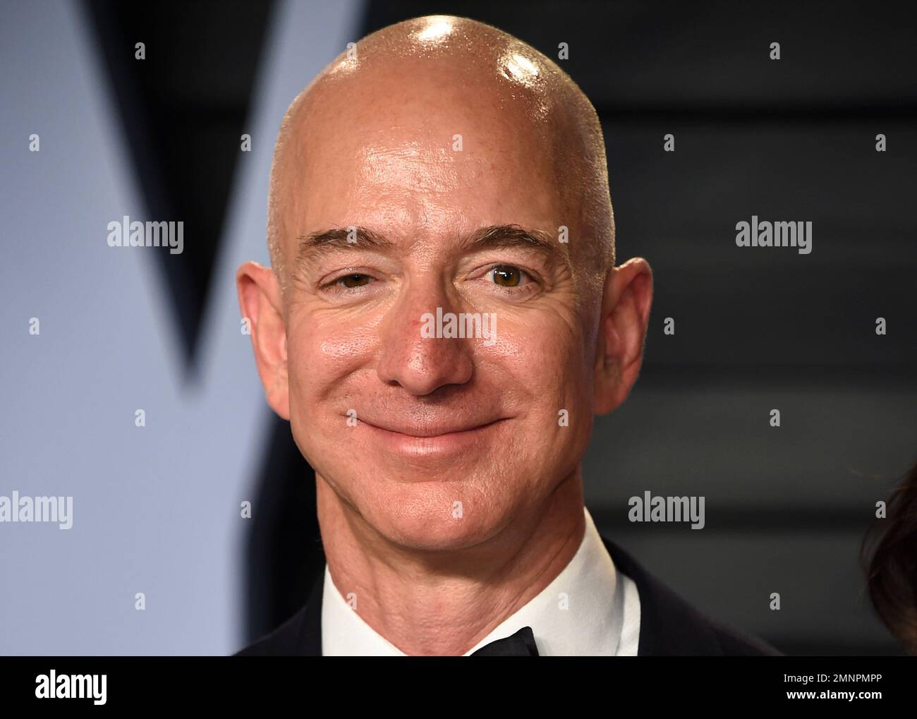 Jeff Bezos arrive at the Vanity Fair Oscar Party on Sunday, March 4 ...