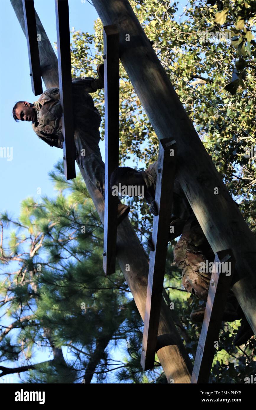 U.S. Soldiers from Squad 7, U.S. Army Reserve (USAR), navigate 