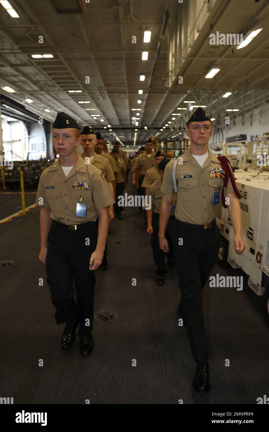 221004-N-ON253-1022 PACIFIC OCEAN (Oct. 04, 2022) Members of the Navy Junior Reserve Officer Training Corps (NJROTC), from El Dorado High School, Las Vegas, march in formation through the hangar bay of the Nimitz-class aircraft carrier USS Abraham Lincoln (CVN 72). Abraham Lincoln is currently moored at Naval Air Station North Island. Stock Photo