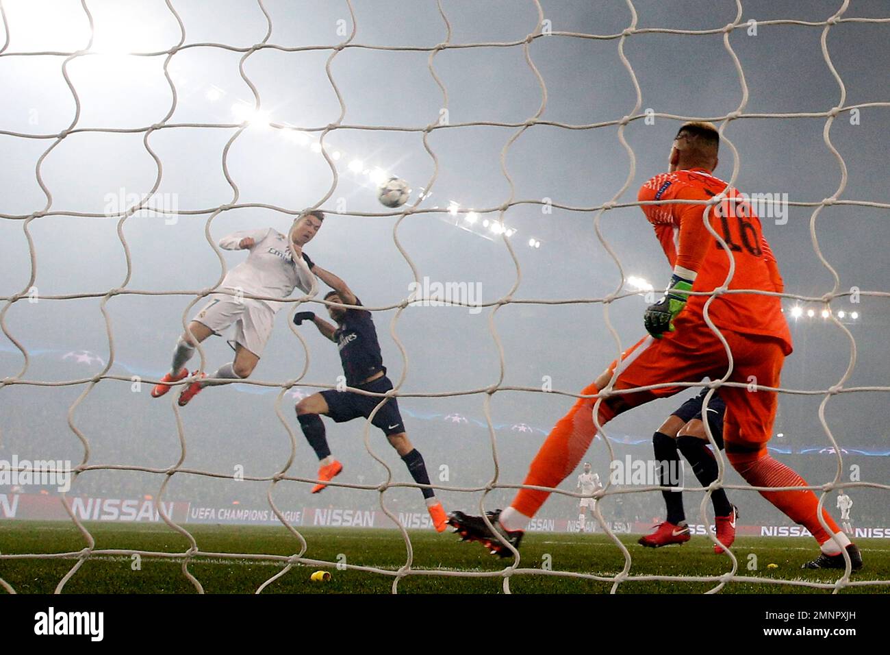 Real Madrid's Cristiano Ronaldo heads the ball to score his side's ...