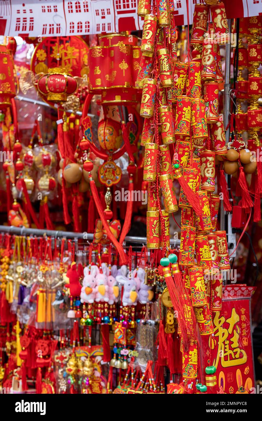 A roadside stall selling New Year's decorations in auspicious red and gold yellow Stock Photo