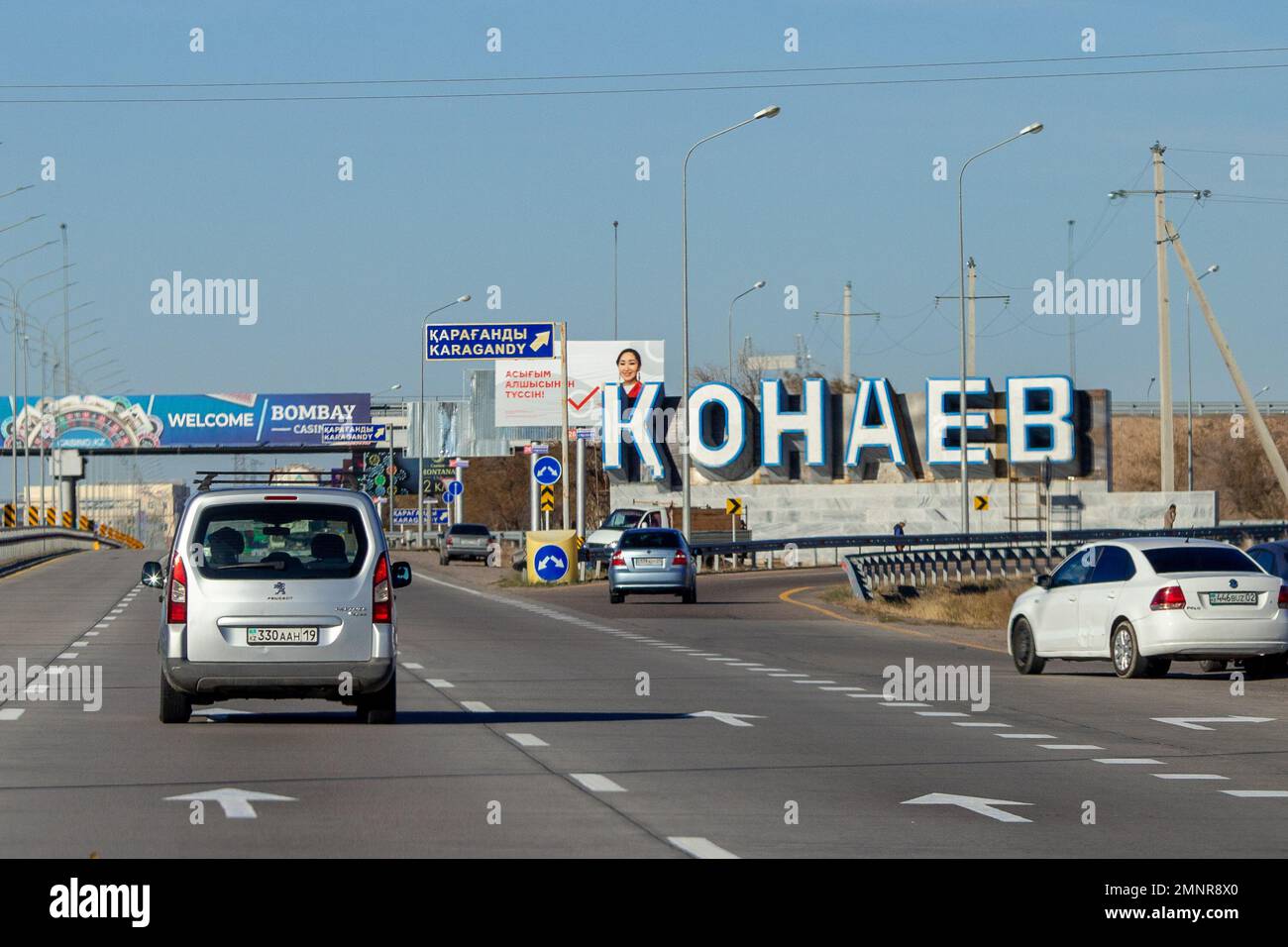 Stele at the entrance of the settlement of the city of Konaev, formerly