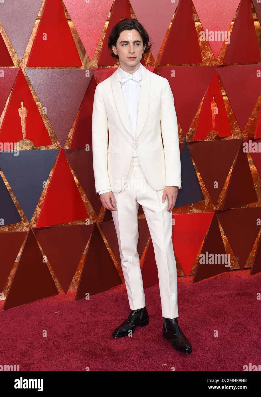Timothee Chalamet arrives at the Oscars on Sunday, March 4, 2018, at ...