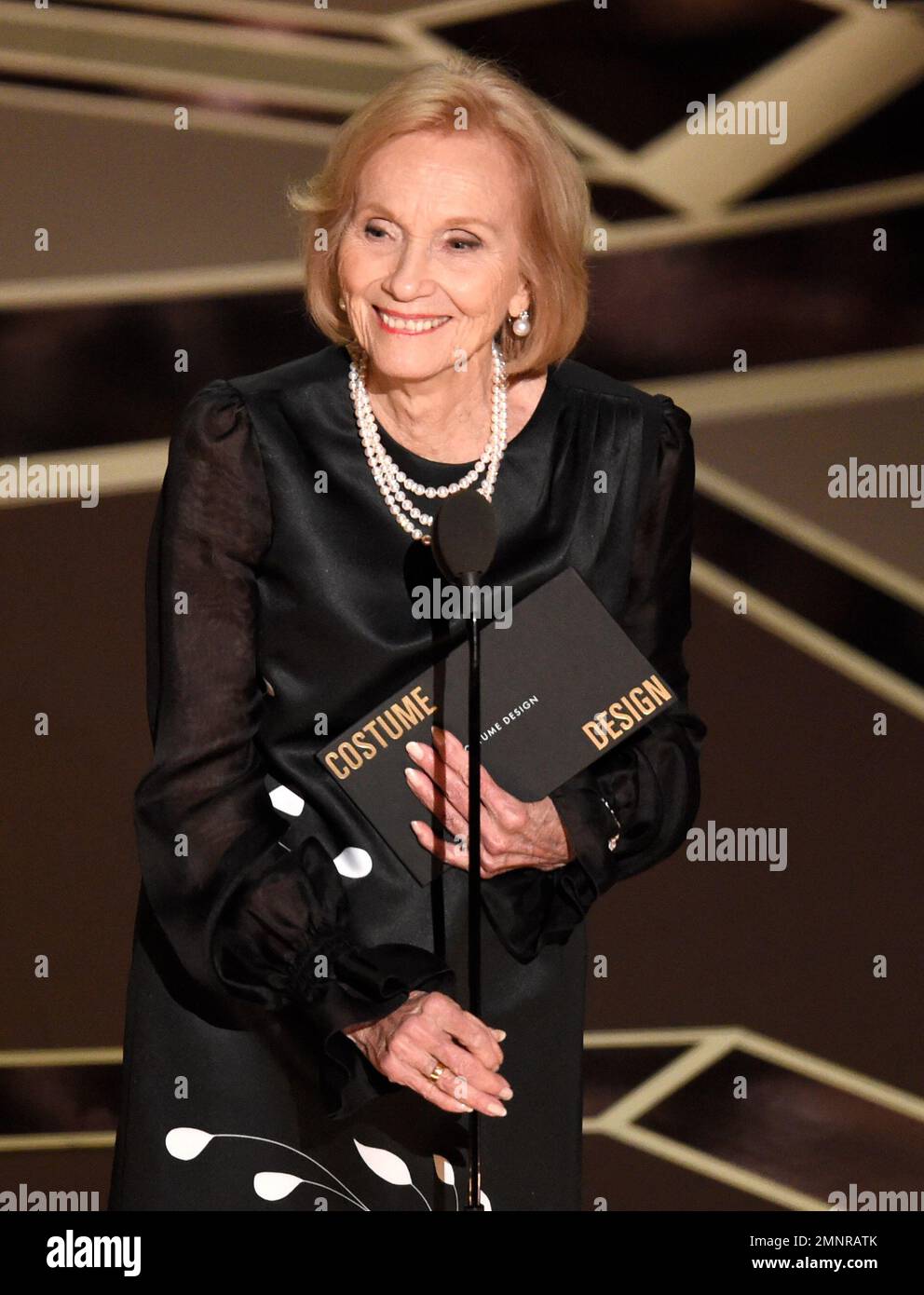 Eva Marie Saint presents the award for best costume design at the Oscars on Sunday, March 4