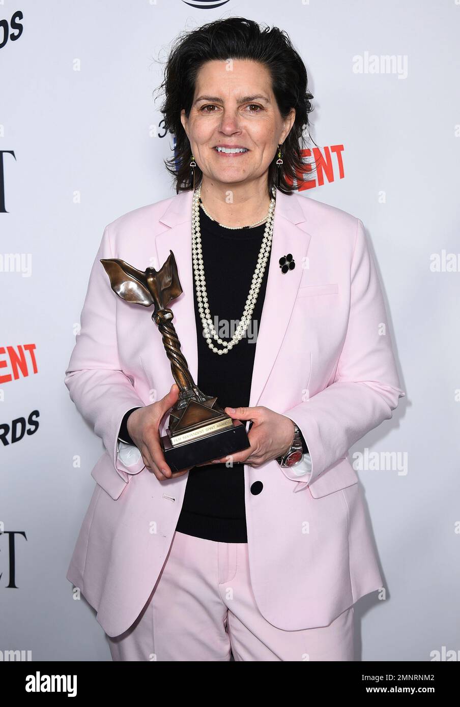 Tatiana S. Riegel poses in the press room with the award for best ...